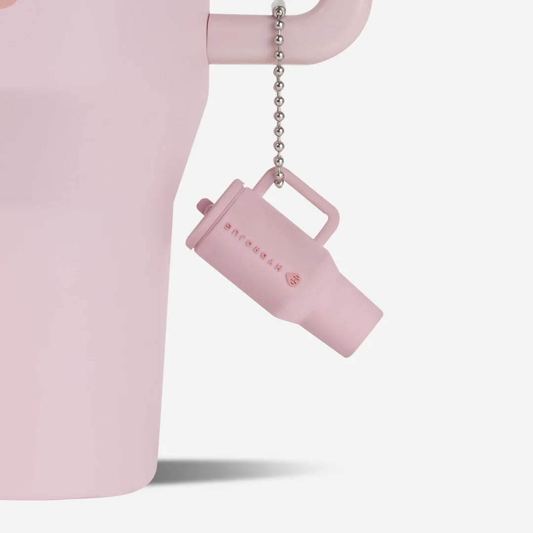 traveler-keychain-o7 Web-TravelerKeychainPhotos-PinkSand2.webp
